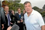  ??  ?? Former England manager Sam Allardyce speaks to media as he leaves his home in Bolton, northern England.