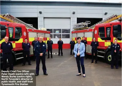  ??  ?? Deputy Chief Fire Officer Peter Heath (centre left) with Wendy Burke (centre right), North Tyneside’s director of public health, and staff from Tynemouth Fire Station