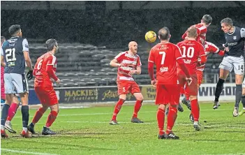  ??  ?? Lee Ashcroft (right) scores for Dundee to make it 2-2 in extra-time