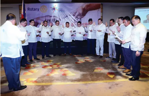  ??  ?? ROTARY Past District 3860 Governor Reynaldo “Boy” I. Reyes inducts East Davao's new set of officers for 2019 – 2020. (from left) Immediate Past President Prudencio "Jun" C. Tan, Jr., Rossano C. Luga, VP Internal, Jim Sabino, Rene, Darwin, Don Panes, Brian Toh, Winston Lim, Manny Nierra, Mike Mabagos, Peter Digal.