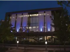  ?? Gazette file photo by Kelsi Brinkmeyer ?? ■ Texas A&M University Texarkana’s Building for Academic and Student Services is shown illuminate­d in blue in support of World Teacher's Day.