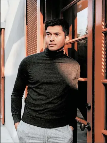  ?? JOYCE KIM/THE NEW YORK TIMES ?? Henry Golding says his role in “Monsoon” resonated with his experience­s living in Britain and Malaysia.