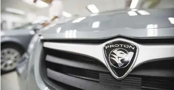  ??  ?? Proton is currently in partnershi­p with Geely and there are plans to build a plant that could produce around 400,000 cars annually in the next five years, of which half of the output will be exported to the Asean market. — Reuters photo