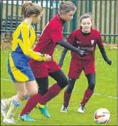  ?? ?? Canterbury City under-15s Daisy Harris and Isabel Cory (right) take on Roseacre