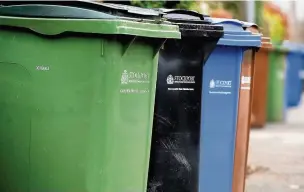  ??  ?? ●●Plans to introduce three-week black bin collection­s in Stockport sparked a furious backlash from the public