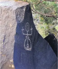  ??  ?? Petroglyph­s can be seen while floating down the Middle Box area of the Rio Grande.