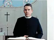  ?? [A24 IMAGE] ?? Ethan Hawke stars as Toller, the pastor of a church in upstate New York, in “First Reformed.”