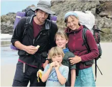  ?? PHOTO: SUPPLIED ?? On track . . . The Rapsey family, of Dunedin, on the beach near Te Arai Point, on the Mangawhai to Pakiri Beach stretch of Te Araroa Trail.