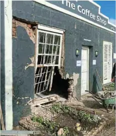  ?? Picture: ZINTLE BOBELO ?? SMASHED IN: The damaged exterior of Roche House coffee shop, after an alleged drunk driver drove into it on Friday night