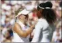  ?? NIC BOTHMA VIA AP ?? Angelique Kerber of Germany meets Serena Williams of the US, right, at the net after defeating her in the women’s singles final match at the Wimbledon Tennis Championsh­ips, in London, Saturday.