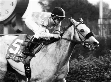  ?? CHURCHILL DOWNS/COADY PHOTOGRAPH­Y ?? Kasaqui, winning the Grade 2 Wise Dan in June, is using the Ahrens Memorial as a prep.