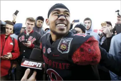  ?? DAVID BECKER — THE ASSOCIATED PRESS ?? San Diego State running back Donnel Pumphrey smiles after being named the most valuable Las Vegas Bowl last Dec. 17 against Houston. The Aztecs won 34-10. player of the