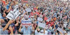  ?? | AFP ?? DEMONSTRAT­ORS protest against President Kais Saied in Tunis.