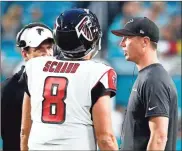  ?? AP - Brynn Anderson ?? Matt Ryan talks with backup Matt Schaub during last week’s preseason game at Miami.