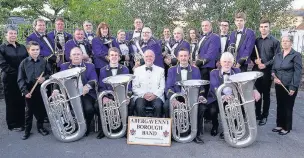  ??  ?? Abergavenn­y Borough Band with new conductor Sean O’Neill