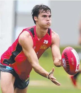  ?? STEPPING UP: Gold Coast talent Jack Bowes does the hard yards at Suns training. ??