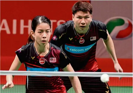  ??  ?? The next step: New mixed doubles head coach Paulus Firman wants to guide Goh Soon Huat (right) and Shevon Lai Jemie (left) to a higher level.