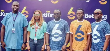  ?? ?? L-R: Head Agency; BetKing Nigeria; Uche Okafor; Head HR Operations; BetKing; Nigeria; Bonike Ayanbadejo; Managing Director; BetKing; Nigeria; Gossy Ukanwoke; Beneficiar­y of the BetKing CSR Initiative and Captain of Ikorodu City Football Club, Captain Ojetoye Waliu; and Head BTL Marketing, BetKing Nigeria, Oludare Kafar during the football banter between staff and agents of BetKing as part of activities marking their 6th anniversar­y in Lagos… recently