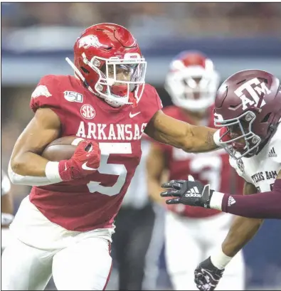  ?? (NWA Democrat-Gazette/Ben Goff) ?? Rakeem Boyd, who had 184 carries for 1,133 yards and 8 rushing touchdowns last season, said he made his decision to stay at Arkansas after discussion­s with Razorbacks Coach Sam Pittman.