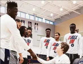  ?? UConn athletics / Contribute­d photo ?? The UConn men's basketball program hosted the Jimenez family Sunday, including 15-year-old Aubrien Jimenez who is fighting cancer.