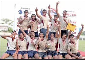  ??  ?? Champion Dharmaraja team poses for a picture after receiving the trophy. The champion team comprised Miyuru Hewawasam (Capt), Thilina Wijesinghe, Buvenaka Udangamuwa, Roshana Hettiarach­chi, Lochana Fernando, Tharaka Wickramana­yake, Lochana Ekanayake,...