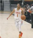 ?? PHOTO BY AJ MASON ?? North Point sophomore guard Malik Lawrence finished with 17 points, nailing three three-pointers in the 69-64 loss to Bishop McNamara in Saturday night’s DMV Tip-Off Classic at North Point High School in Waldorf.
