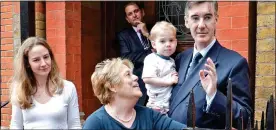  ??  ?? Charges: Nanny Veronica Crook with her employer Jacob Rees-Mogg