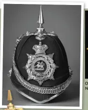  ??  ?? Above: Officer’s helmet, the Buffs (East Kent Regiment). This pattern helmet plate, with the additional scroll ‘The Buffs’ just below the crown, was introduced in 1900