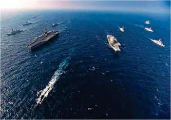  ??  ?? (Top & Above) Ships from the Royal Australian navy, Indian navy, Japan Maritime Self-Defense Force, and the US Navy participat­e in exercise Malabar 2020
