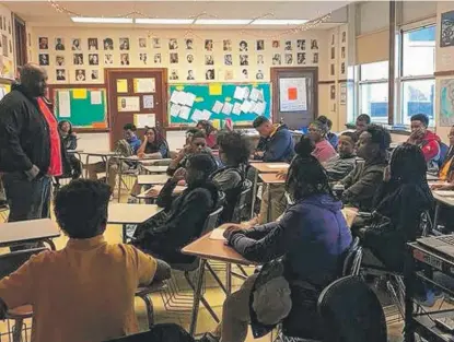  ?? DAVE STEIBER/ PROVIDED PHOTO ?? Evan F. Moore speaks to students at Chicago Vocational Career Academy in the Avalon Park neighborho­od.