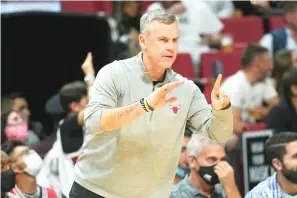  ?? AP Photo/Marta Lavandier ?? ■ Chicago Bulls head coach Billy Donovan gestures Saturday during the first half of an NBA basketball game against the Miami Heat in Miami.