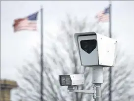  ??  ?? The red light cameras at the intersecti­on of West Third Street and Edwin C. Moses Boulevard in Dayton have continued operating.