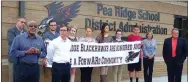  ?? TIMES photograph by Annette Beard ?? Dr. Kenneth Jones commended Pea Ridge at a ceremony honoring the school and commity as one of five commnities in the state named a ForwARd Community. Students Jaylee Kelly, Stephanie Sanders, Kaiya Hook, Morgan Guyll, Lexi Garrett and Trevor Helton...