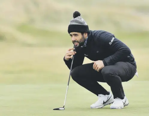  ??  ?? 0 Spaniard Adrian Otaegui lines up an eventual birdie putt on the 18th green in the first round at Fairmont St Andrews.