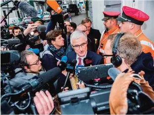  ??  ?? BRUSSELS: Minister-President of Belgium Flemish-speaking Flanders Region Geert Bourgeois answers journalist­s as he leaves an emergency meeting of all Belgium federal entities on the EUCanada Comprehens­ive Economic and Trade Agreement (CETA) in Brussels...