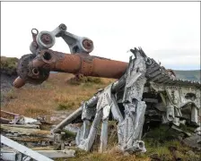  ??  ?? The wreckage lies on bog atop Tievebaun Mt, Ballintril­lick.