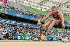  ?? ?? Matt Dunham/Associated Press The USA’s Trey Hardee makes an attempt in the Decathlon Long Jump at the World Athletics Championsh­ips in Daegu, South Korea in 2011.