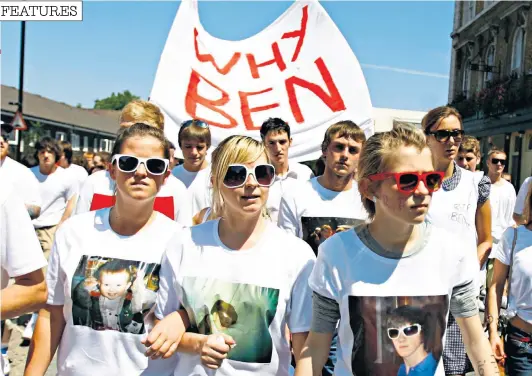  ??  ?? Dark days: Brooke, centre, and sisters Jade, left, and Georgia, march in the aftermath of Ben’s murder. Amber Rudd, below, unveiled a new strategy this week