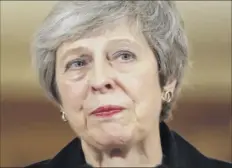  ?? Getty Images ?? British Prime Minister Theresa May gives a press conference Thursday while battling a rebellion over her Brexit deal. Several ministers resigned in protest.