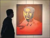  ?? AFP ?? The silkscreen image was derived from an official portrait of Mao on the cover of a book.