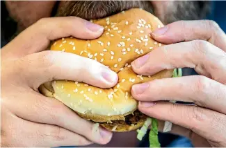  ?? STUFF ?? The latest burgernomi­cs update found a McDonald’s Big Mac costs NZ$7.10 in New Zealand and US$5.15 in the United States, implying a different exchange rate to the actual rate.