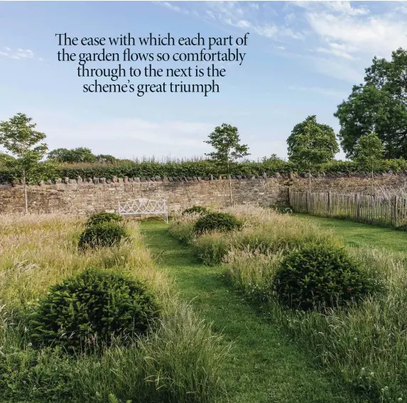  ??  ?? Above The Willow Garden, a simple but effective grid of rumpled yew domes set in long grass with an inviting bench that catches the evening sun. Beyond the paling fence is the Vegetable Garden.