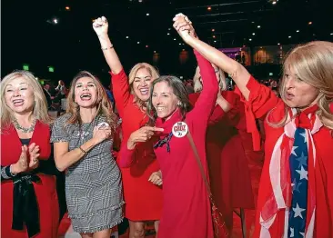  ?? AP ?? Members of the Trumpettes celebrate as incumbent US Senator Ted Cruz, R-Texas, is announced as the winner over Democratic challenger Beto O’Rourke in a tightly contested race at the Dallas County Republican Party election night watch party yesterday.