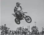  ?? PHOTO PROVIDED BY TINA GROSS VIA JESSICA LYNN TEN HAGEN ?? River Valley sixth-grader Ely Gross makes a jump during a motocross event.