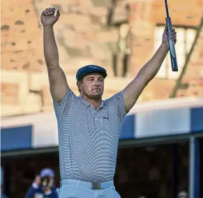  ??  ?? Breakthrou­gh victory: Bryson DeChambeau celebrates after sinking his final putt to win the US Open. — AP