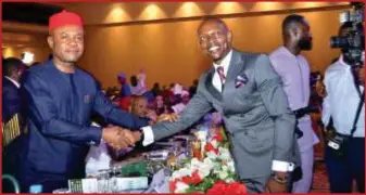  ?? ?? L-R: Enugu State Governor, Dr Peter Mba; and the CEO of Richland Property and Homes Limited, Dr Ifeanyi Nwachukwu at an Awards ceremony where the Governor was honoured as Governor of the Year while Dr Nwachukwu was honoured as Businessma­n of the Year