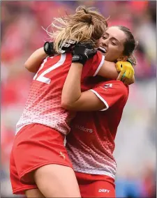  ??  ?? Aoife Russell, 12, and Eilis Hand of Louth celebrate.