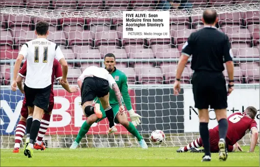  ?? PICTURES: Media Image Ltd ?? FIVE ALIVE: Sean McGuire fires home Accrington Stanley’s fifth