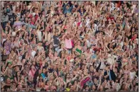  ?? (The Sacramento Bee/TNS/Kevin Neri) ?? Fans cheer at Levi Stadium in Santa Clara, Calif., on July 28 during Taylor Swift The Eras Tour.