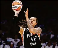 ?? Ralph Freso / Associated Press ?? Phoenix Mercury center Brittney Griner shoots during the first half of Game 1 of the WNBA Finals against the Chicago Sky in October.